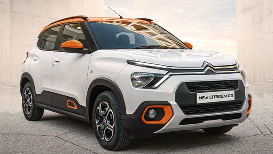 Front three-quarter view of a Polar White with Cosmo Blue Citroen C3