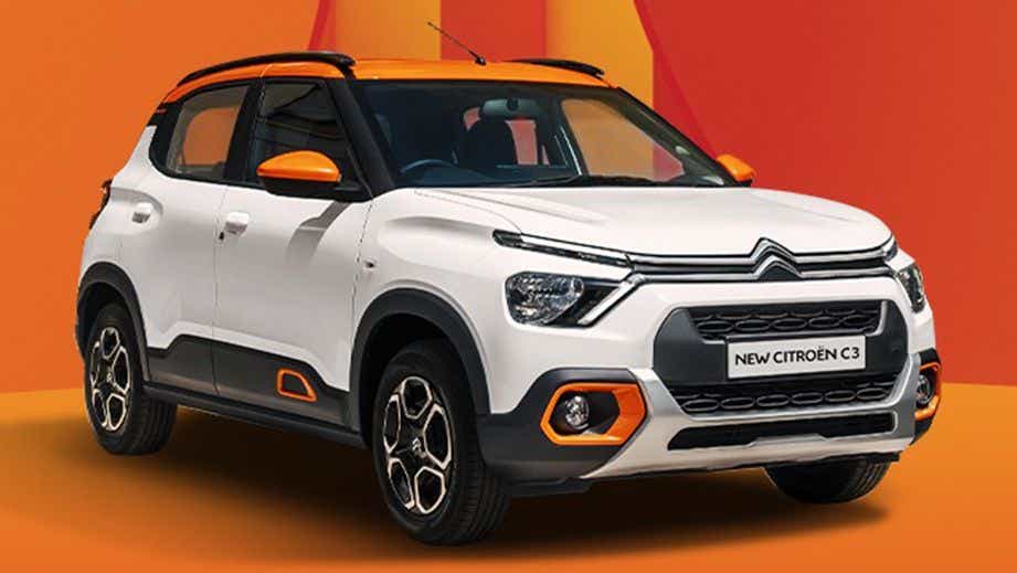 Front three-quarter view of a Polar White with Cosmo Blue Citroen C3