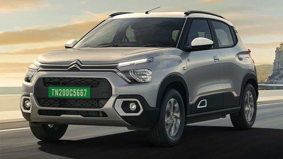 front three-quarter of a Polar White with Platinum Grey Citroen eC3