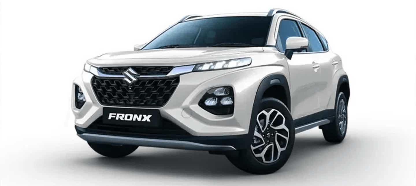 front three-quarter of a Arctic White Maruti Suzuki FRONX