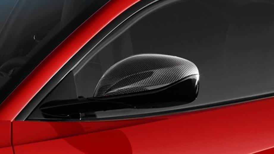 Side mirror close-up of a Ferrari 812