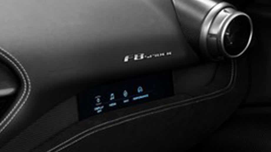 dashboard and passenger-side vent of a Ferrari F8 Tributo