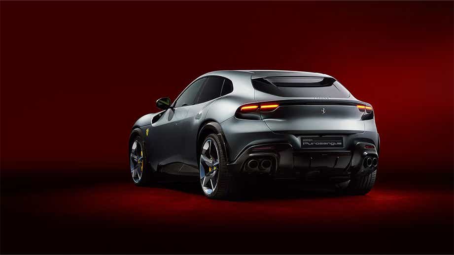 rear three-quarter of a Dsat Silver Ferrari Purosangue