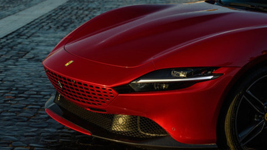 front end of a Rosso Mugello Ferrari Roma