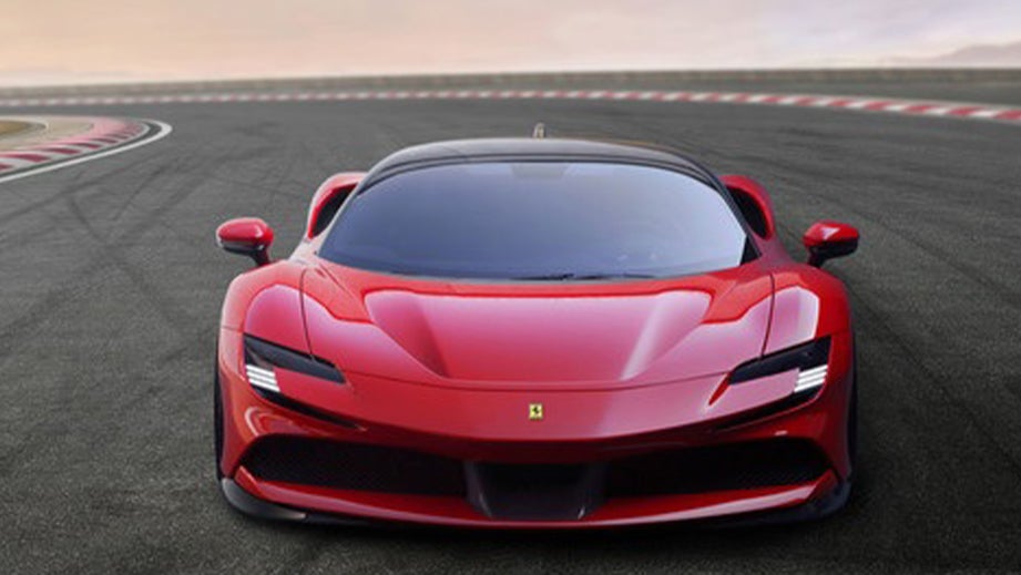 front view of a Ferrari SF90 Stradale on a racetrack