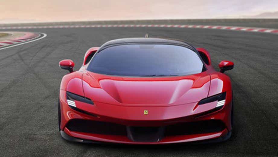 front view of a Ferrari SF90 Stradale on a racetrack