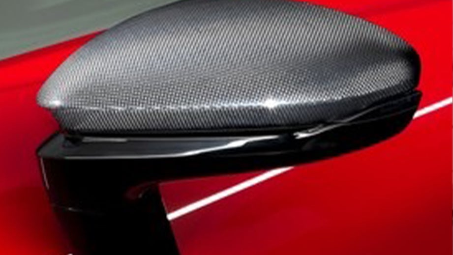 Side mirror close-up of a Ferrari SF90 Stradale