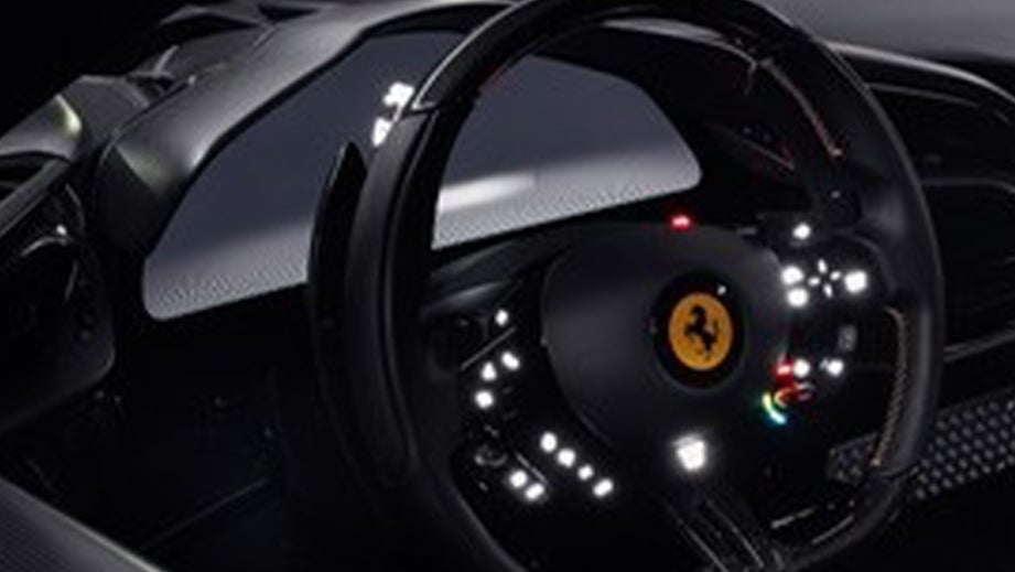 steering wheel and dashboard of a Ferrari SF90 Stradale