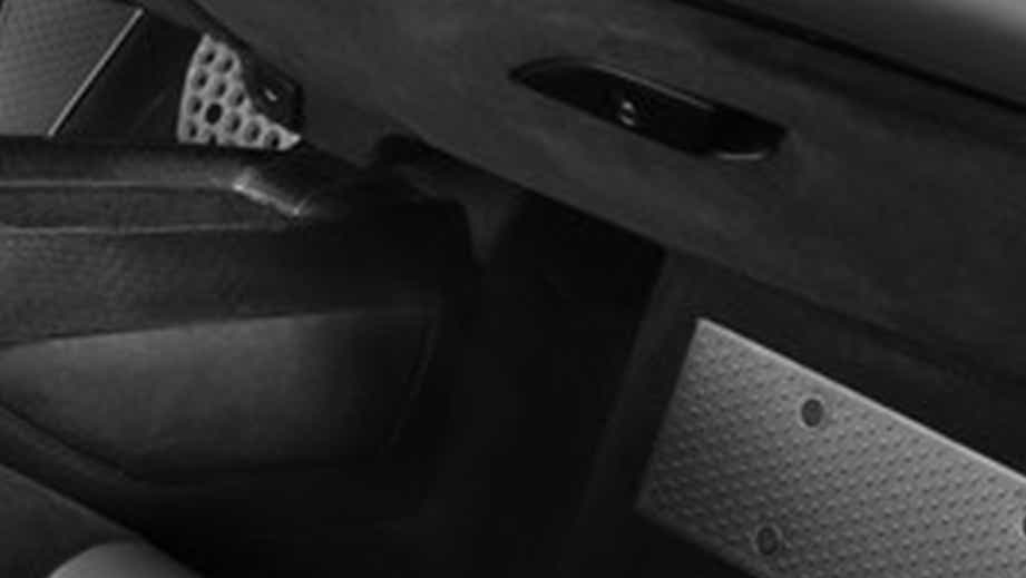 close-up of the interior door panel of a Ferrari SF90 Stradale