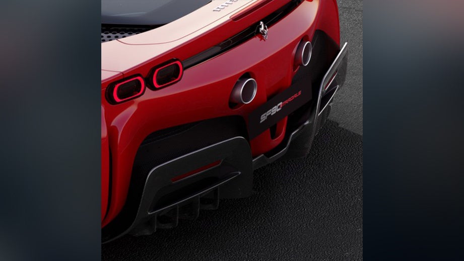 Rear close-up of a Rosso Corsa Ferrari SF90 Stradale