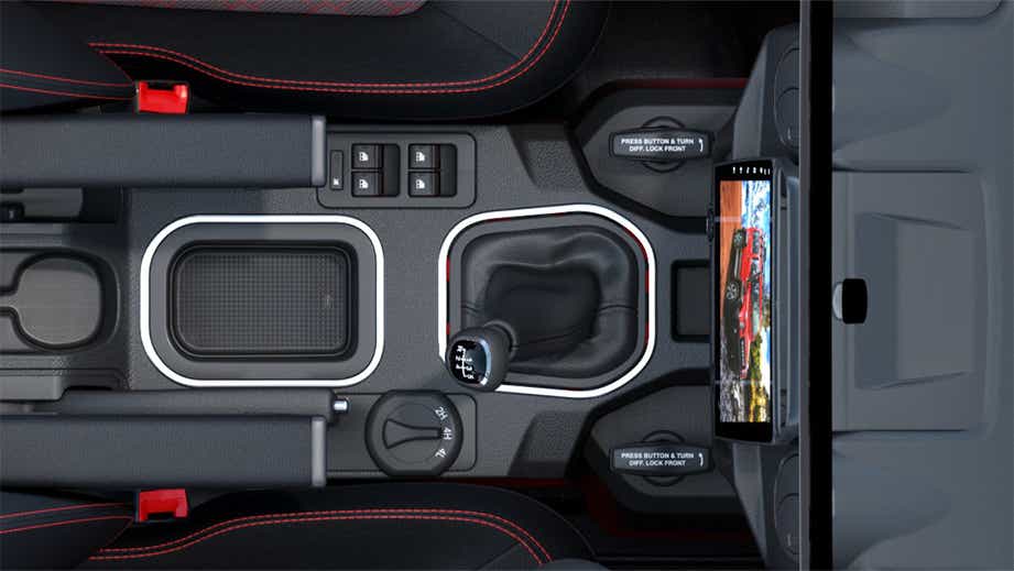 Top view of center console and gear shifter in a Force Gurkha 5-Door