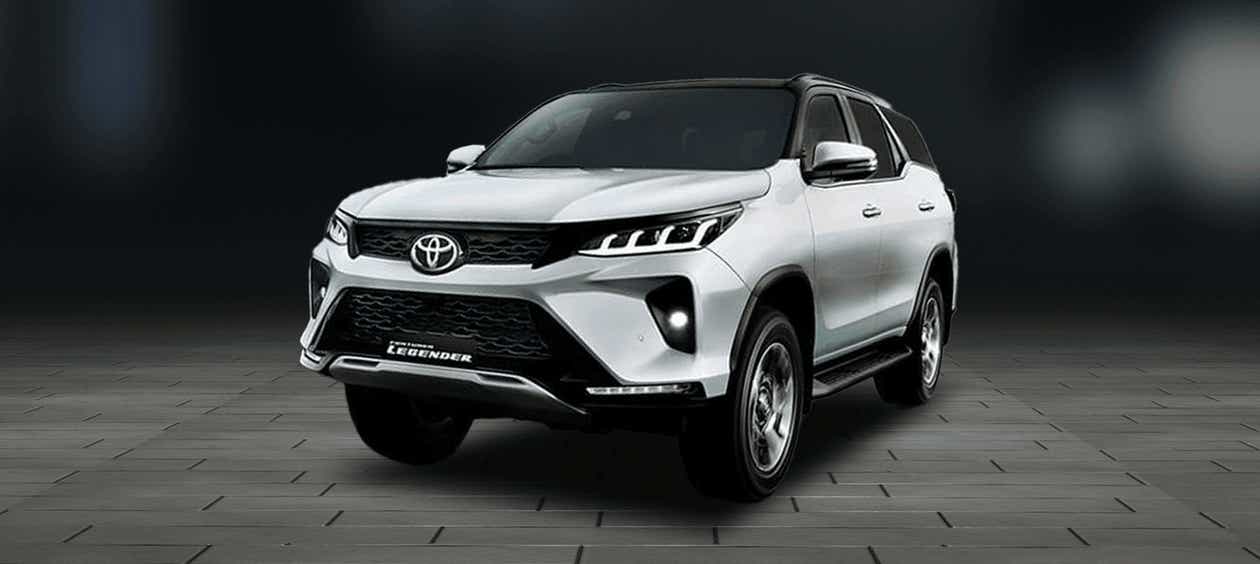 Front three-quarter view of a Platinum White Pearl Toyota Fortuner Legender
