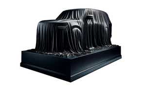 Covered car side view of a Tata Safari EV