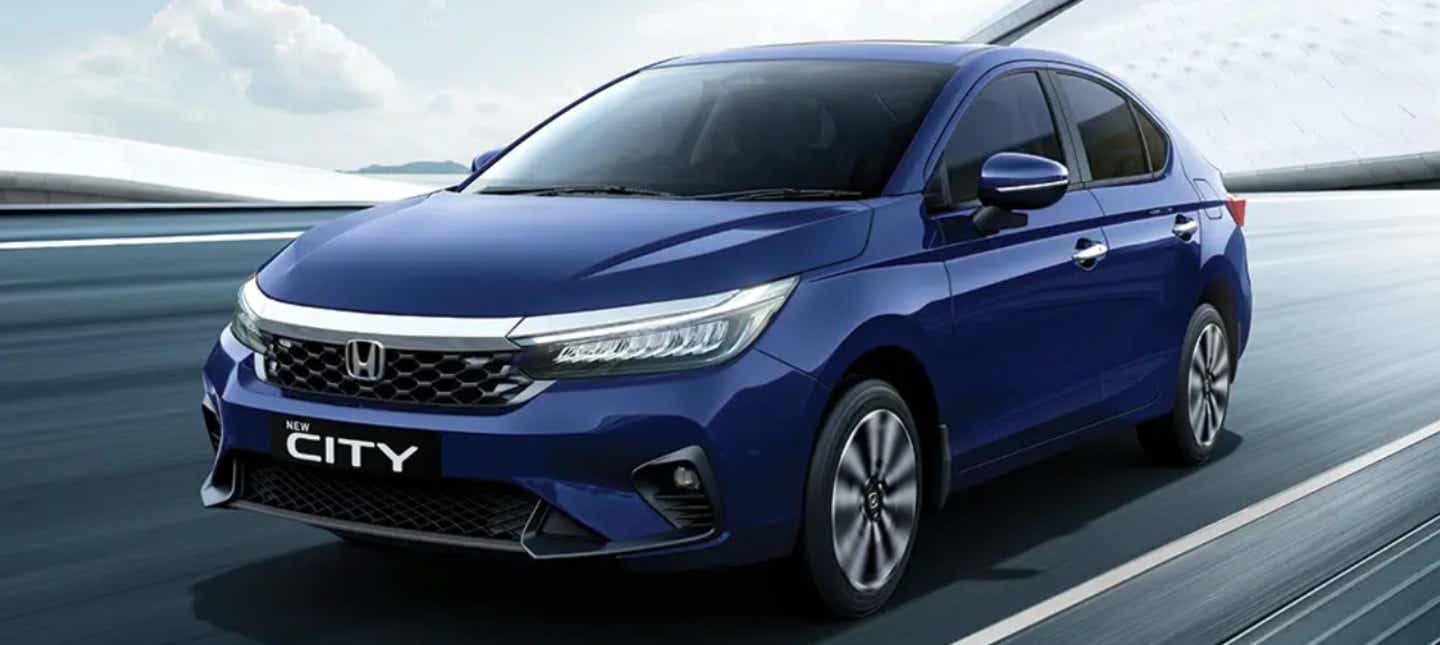 front three-quarter view of a Obsidian Blue Pearl Honda City