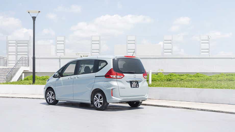 rear three-quarter view of a Honda Freed