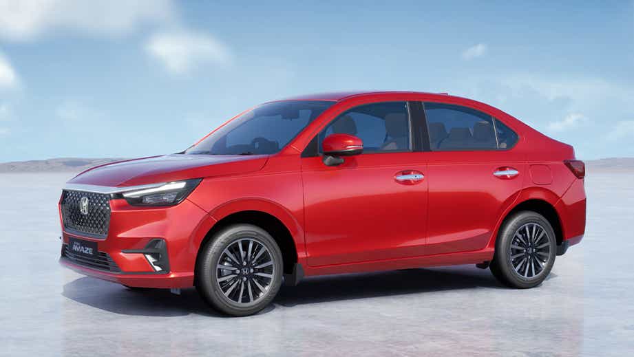 side view of a Radiant Red Metallic Honda Amaze