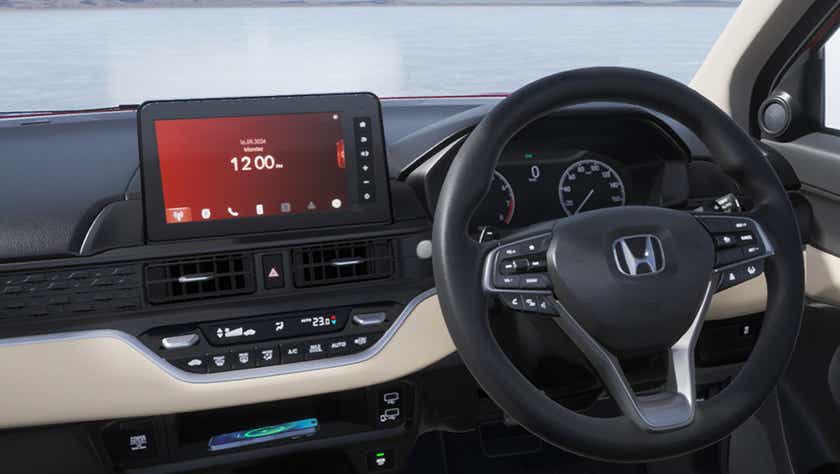 Interior dashboard and steering wheel of a Honda Amaze