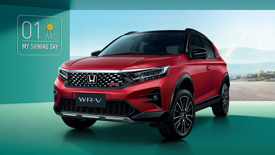 Front three-quarter view of a Ignite Red Metallic Honda WR-V