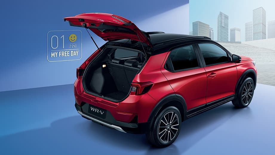 Rear three-quarter view of a Ignite Red Metallic Honda WR-V with open boot