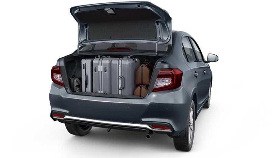 open trunk view of a Honda Amaze 2022-2023 loaded with luggage