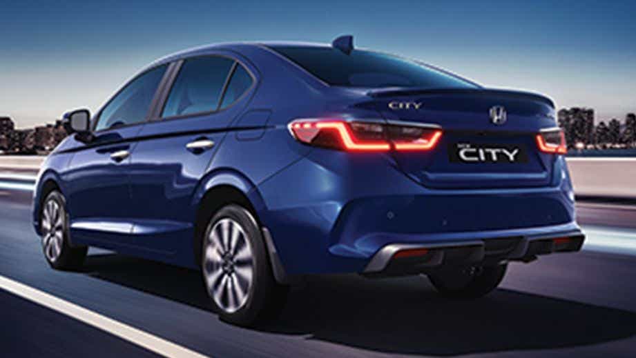 rear three-quarter of a Obsidian Blue Pearl Honda City