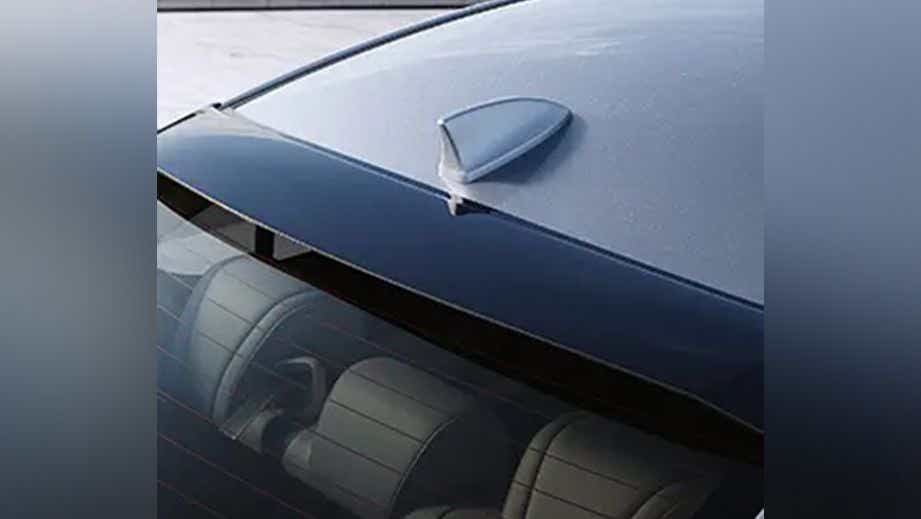 Roof and rear windshield of a Honda City Hybrid showing shark fin antenna
