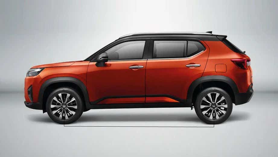 side view of a Phoenix Orange Pearl Honda Elevate