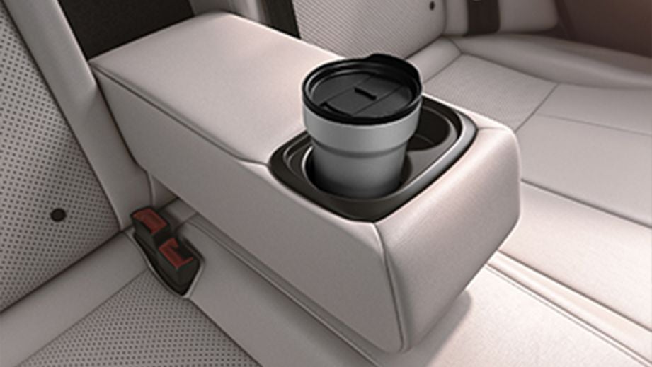 Rear seat armrest with cupholder of a Honda City