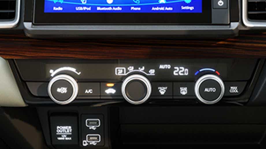 Interior dashboard controls of a Honda City