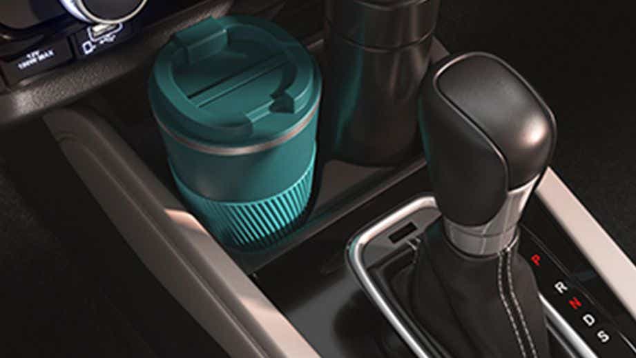 Gear lever and cup holders of a Honda City