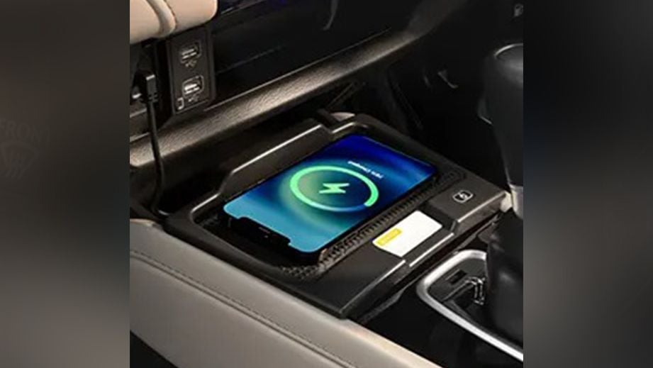 Interior console wireless phone charging pad of a Honda City
