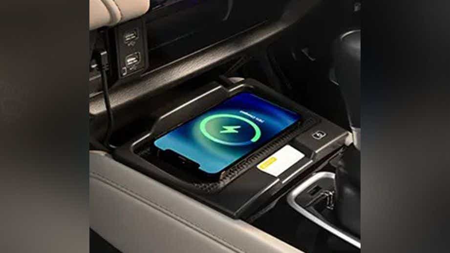 Interior console wireless phone charging pad of a Honda City