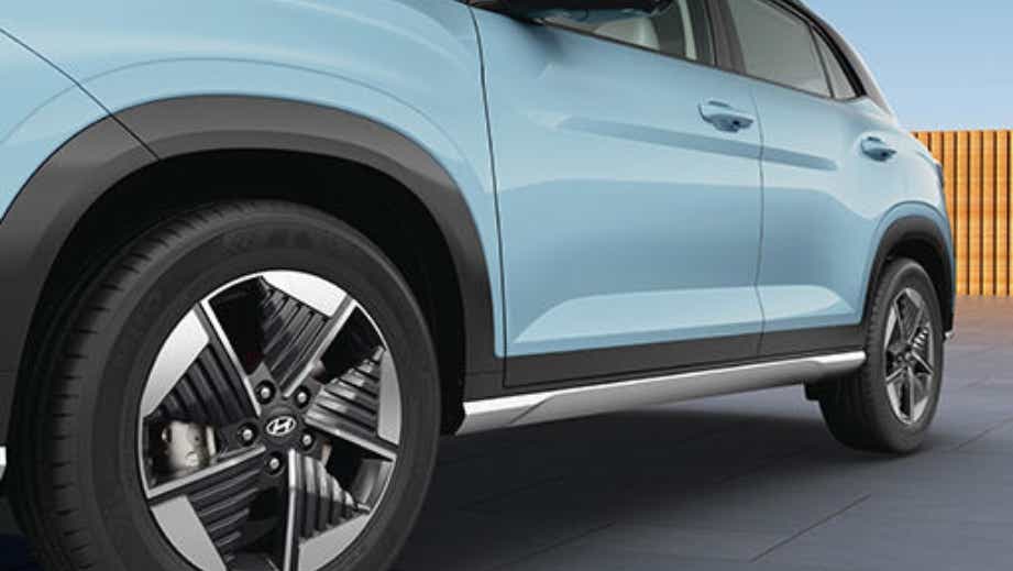 side view of a Ocean Blue Hyundai Creta Electric