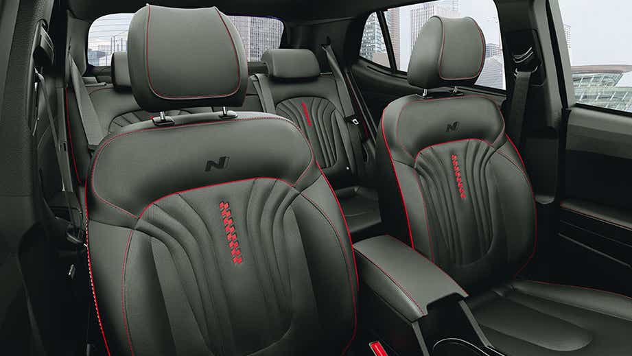 Interior view of a Hyundai Creta N Line featuring front and rear seats