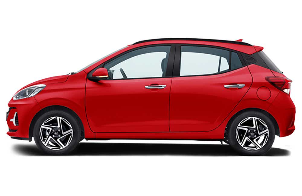 side view of a Fiery Red Hyundai Grand i10 Nios