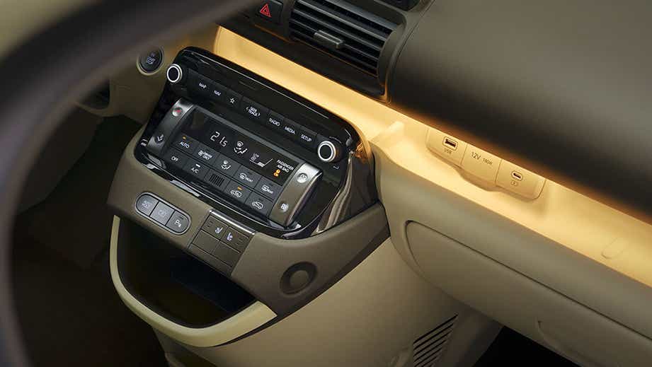Interior dashboard controls of a Hyundai Inster EV