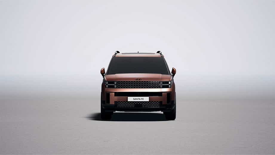 Front view of a Earthy Brass Matte Hyundai New Santa Fe