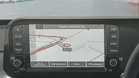 Infotainment display of a Hyundai Exter showing navigation in Mumbai