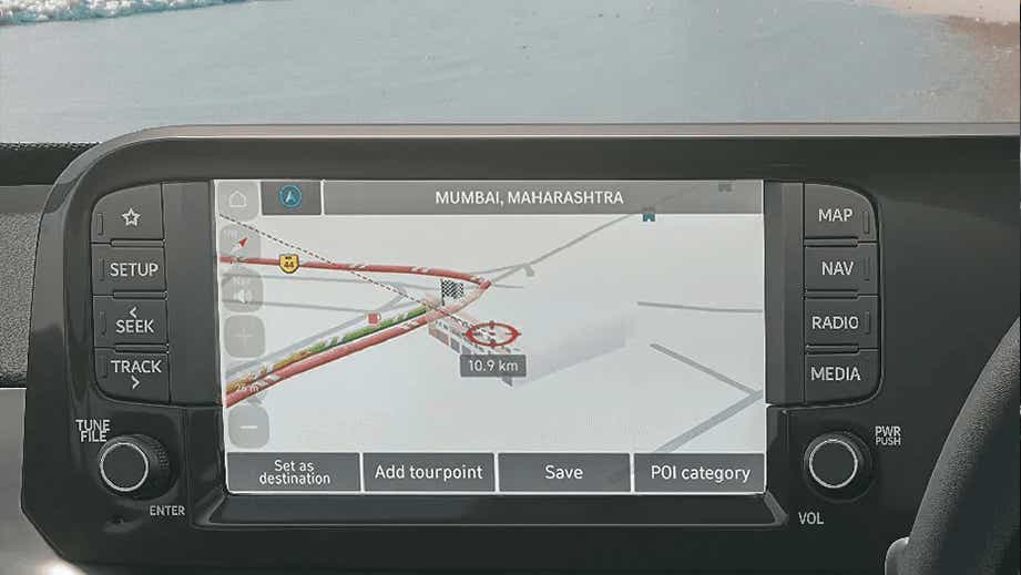 Infotainment display of a Hyundai Exter showing navigation in Mumbai