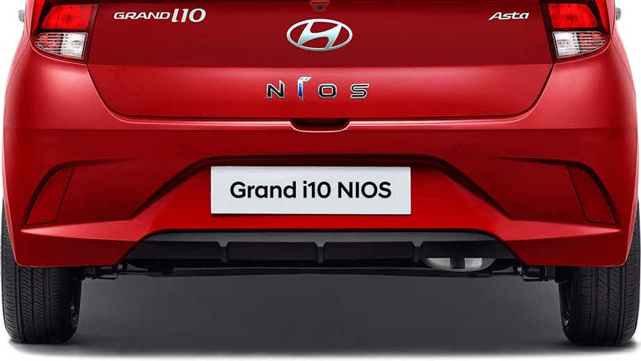 Rear view of a Fiery Red Hyundai Grand i10 Nios Asta