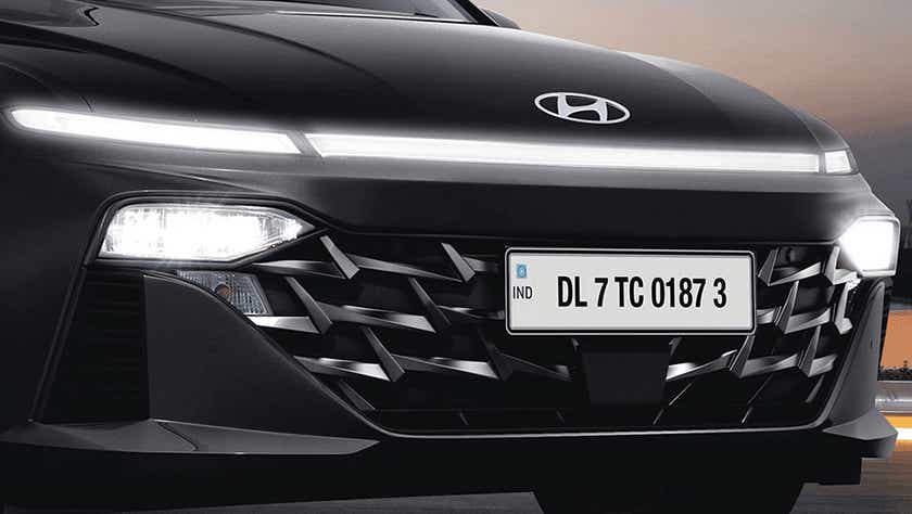 Front grille and headlight close-up of a Hyundai Verna