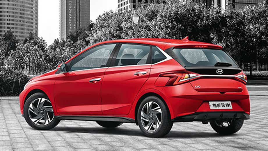 rear three-quarter of a Fiery Red Hyundai i20