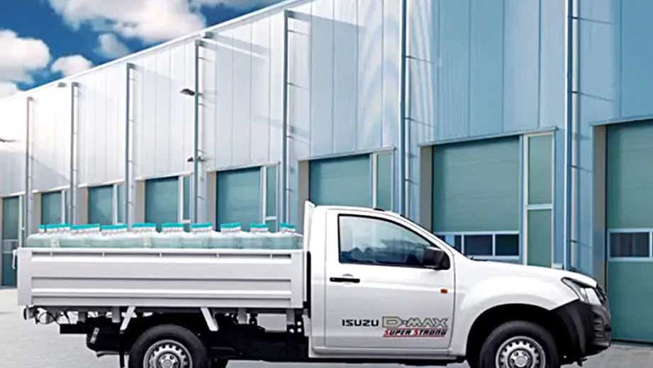 side view of a Splash White Isuzu D-Max pickup truck