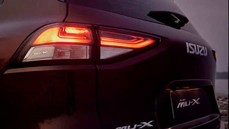 Rear tail light view of an Isuzu MU-X