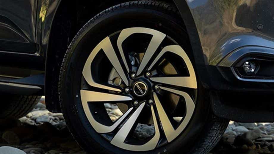 Front wheel close-up of an Isuzu MU-X