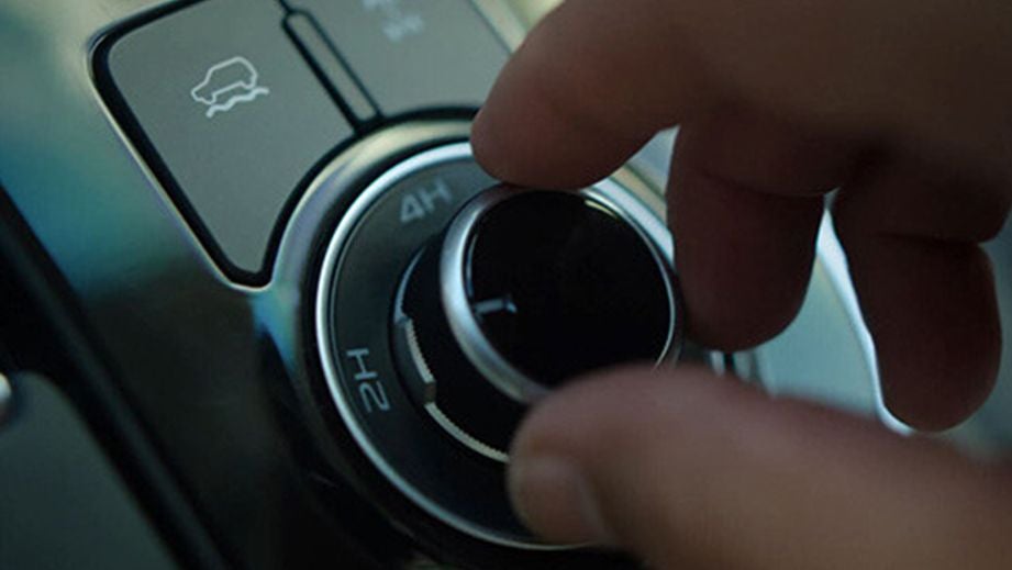 Drive mode selector dial close-up of an Isuzu MU-X