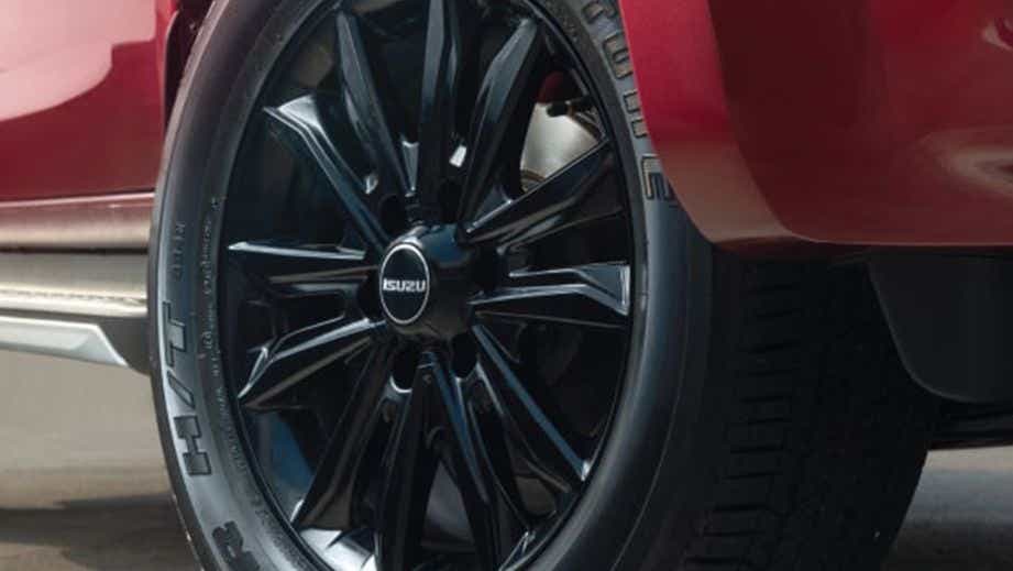 Close-up of wheel and alloy of a Isuzu V-Cross