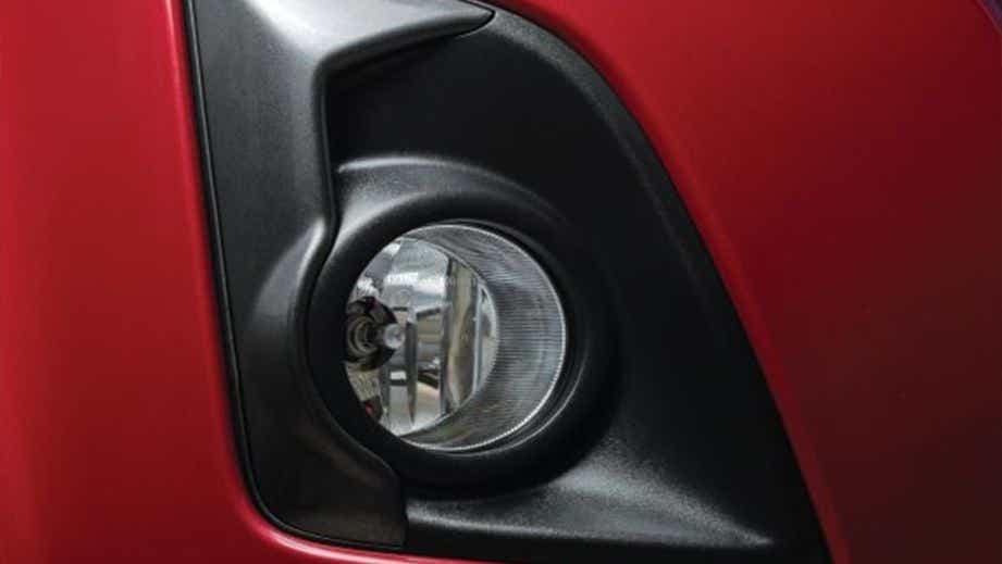 Fog light close-up of a Red Spinal Mica Isuzu V-Cross