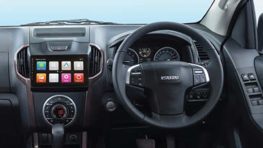 Interior dashboard and steering wheel of a Isuzu V-Cross