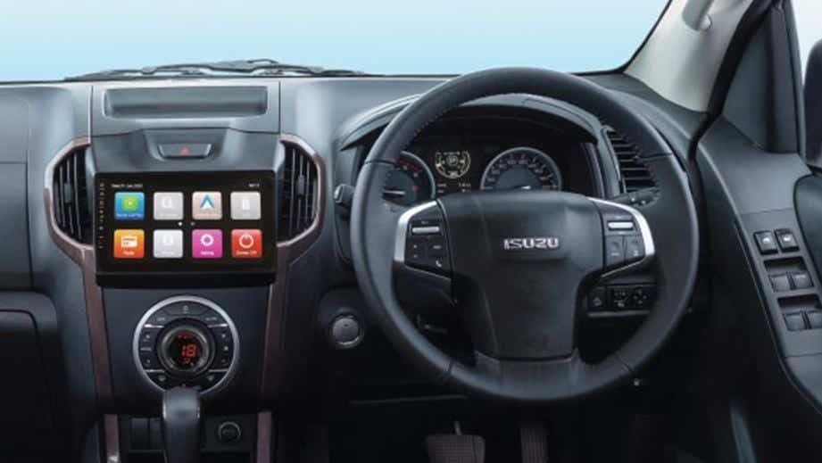 Interior dashboard and steering wheel of a Isuzu V-Cross